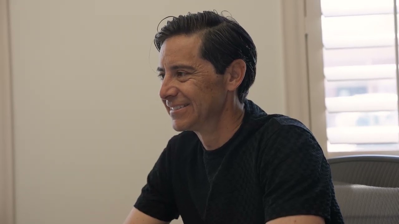 Isaiah Jerez listens to his client John
